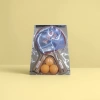 A red racket with three orange table tennis professional training sets details Picture